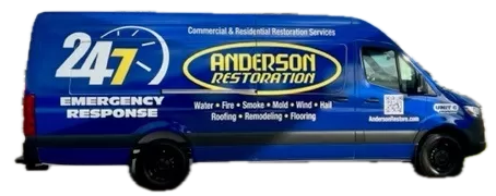 Blue Anderson Restoration van with 24/7 emergency response and service details displayed.