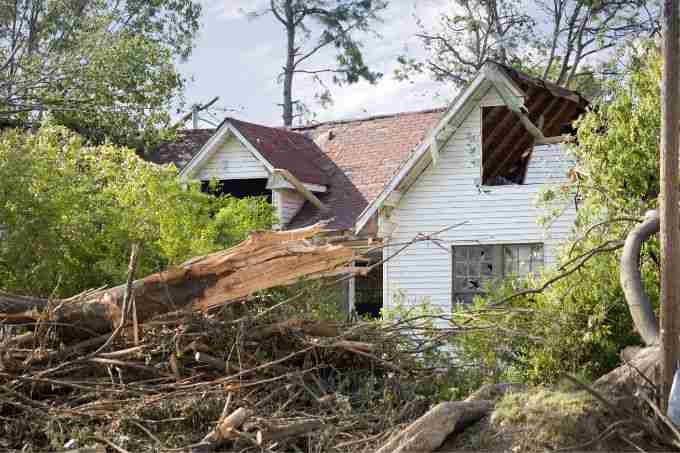 strong houston wind damage that has torn off roof and smaller tree branches. Heavy cleanup and restoration will need to be done by a houston restoration company like Anderson Restoration