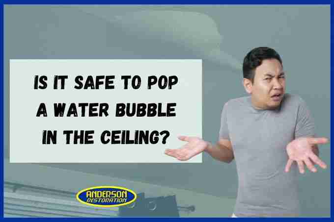 An image of man being curious about popping water bubble in the ceiling.