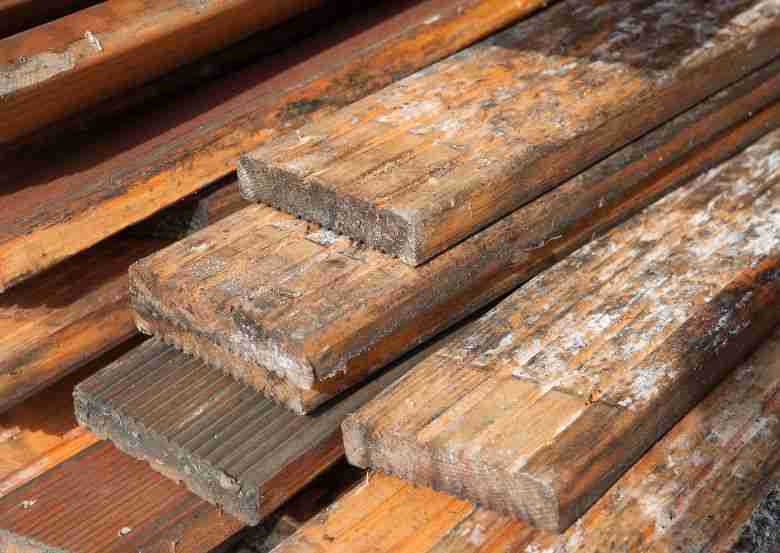 remove mold from wood can be harder than you think. you can see that mold spores penetrated this wood to where we can't use the wood anymore. Contacting mold experts from Anderson Restoration can help.
