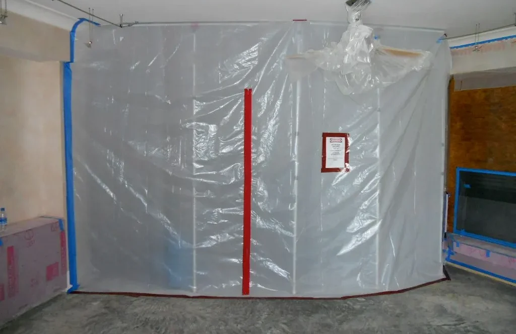 Plastic containment barrier set up for indoor mold remediation process in waller, tx.