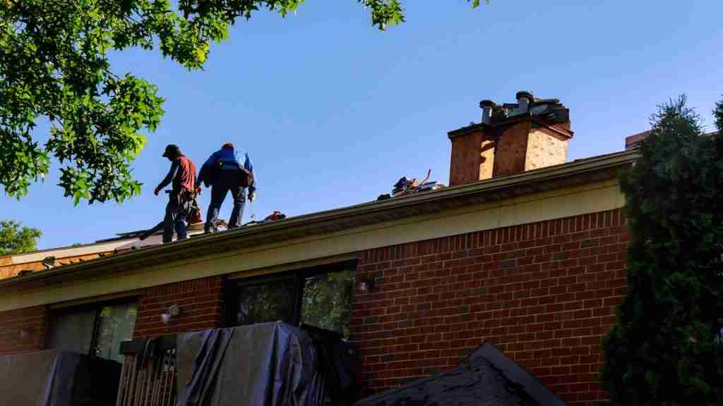 Anderson Restoration crew mid-installation on a residential roof