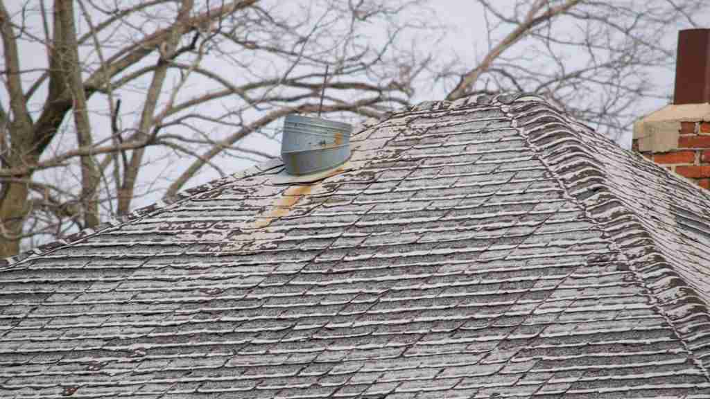 Split image showing a roof that looks fine from ground level on one side