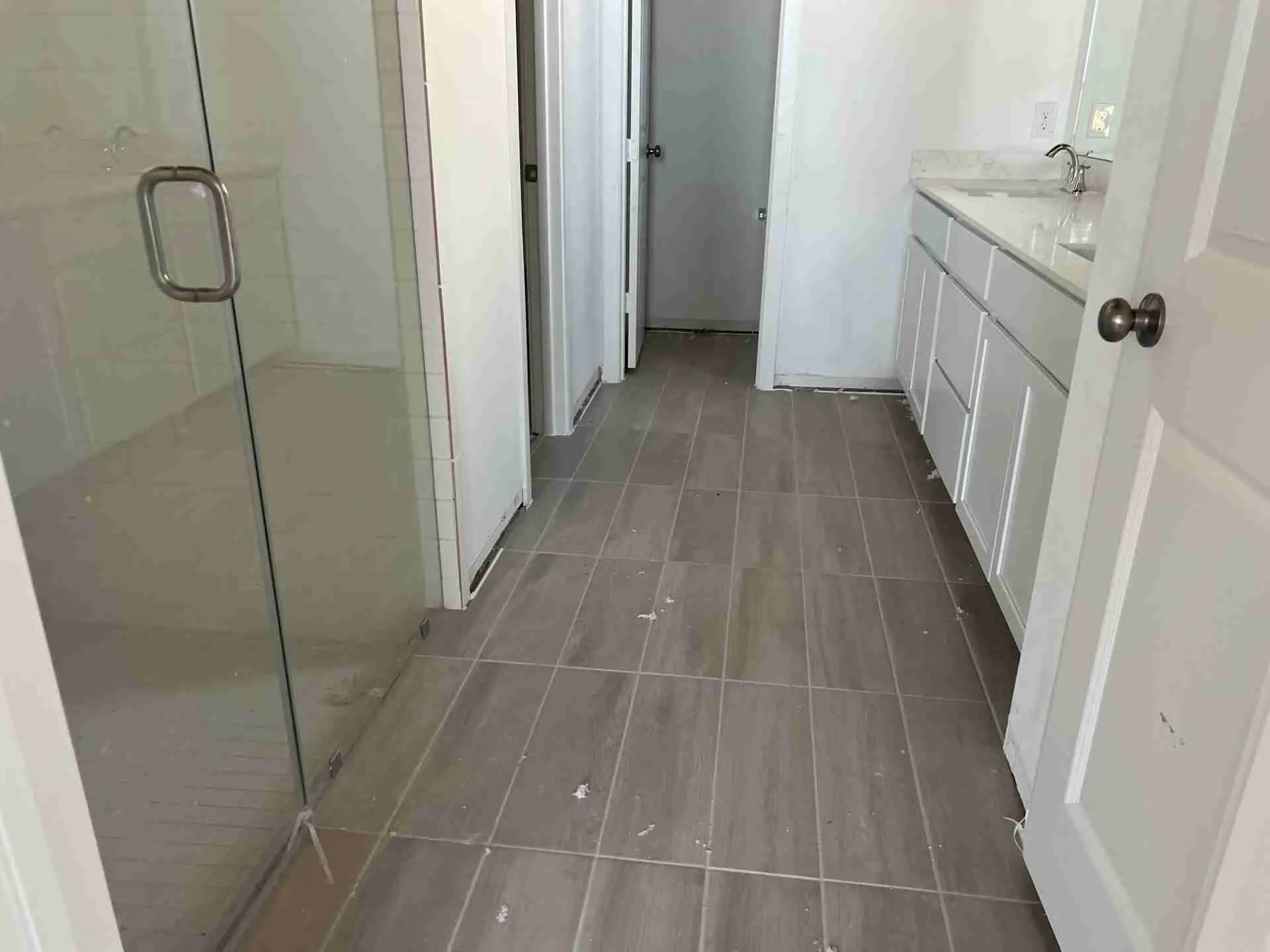 Dried and cleared primary bathroom ready for reconstruction in a Fulshear TX home