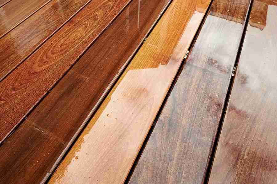Buckled hardwood flooring from water damage in a Houston area kitchen before professional structural drying